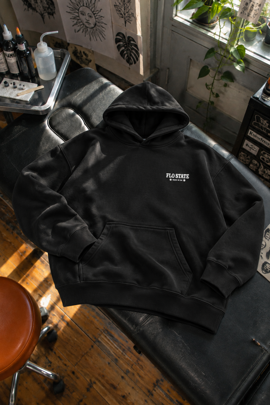 Black FLO STATE hoodie studio flatlay-1.png
