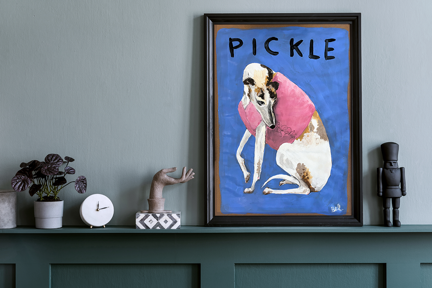 Pickle framed in green room.png