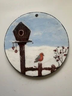 Birdhouse with Bird on Fence