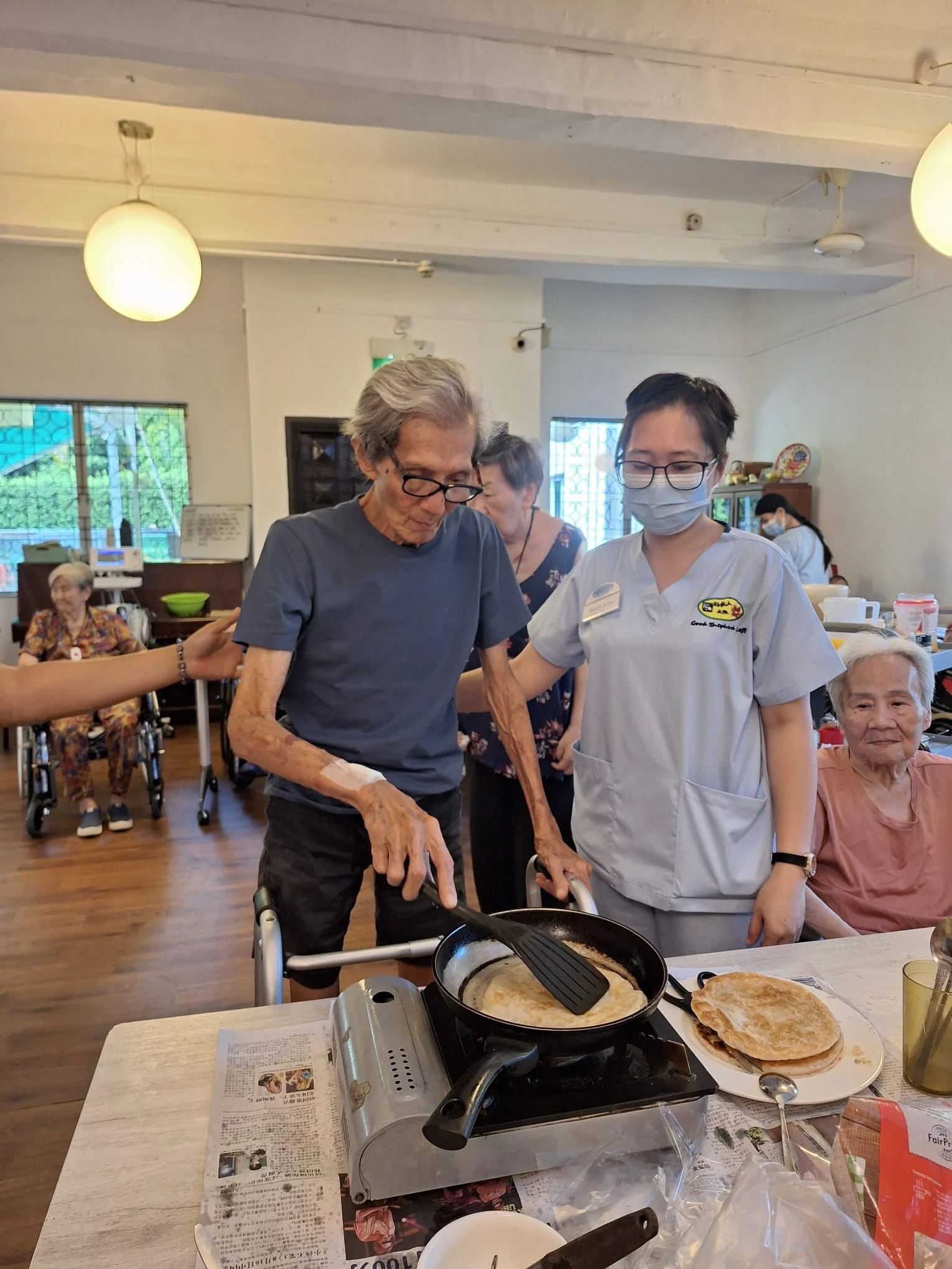 Healthcare students and professionals training in a modern clinical simulation ward at Providence Training Academy.