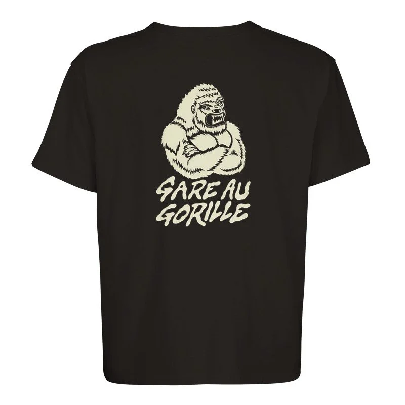 Un t-shirt noir avec un dessin d'un gorille avec des bras croisés et le texte en français 'GARE AU GORILLE'