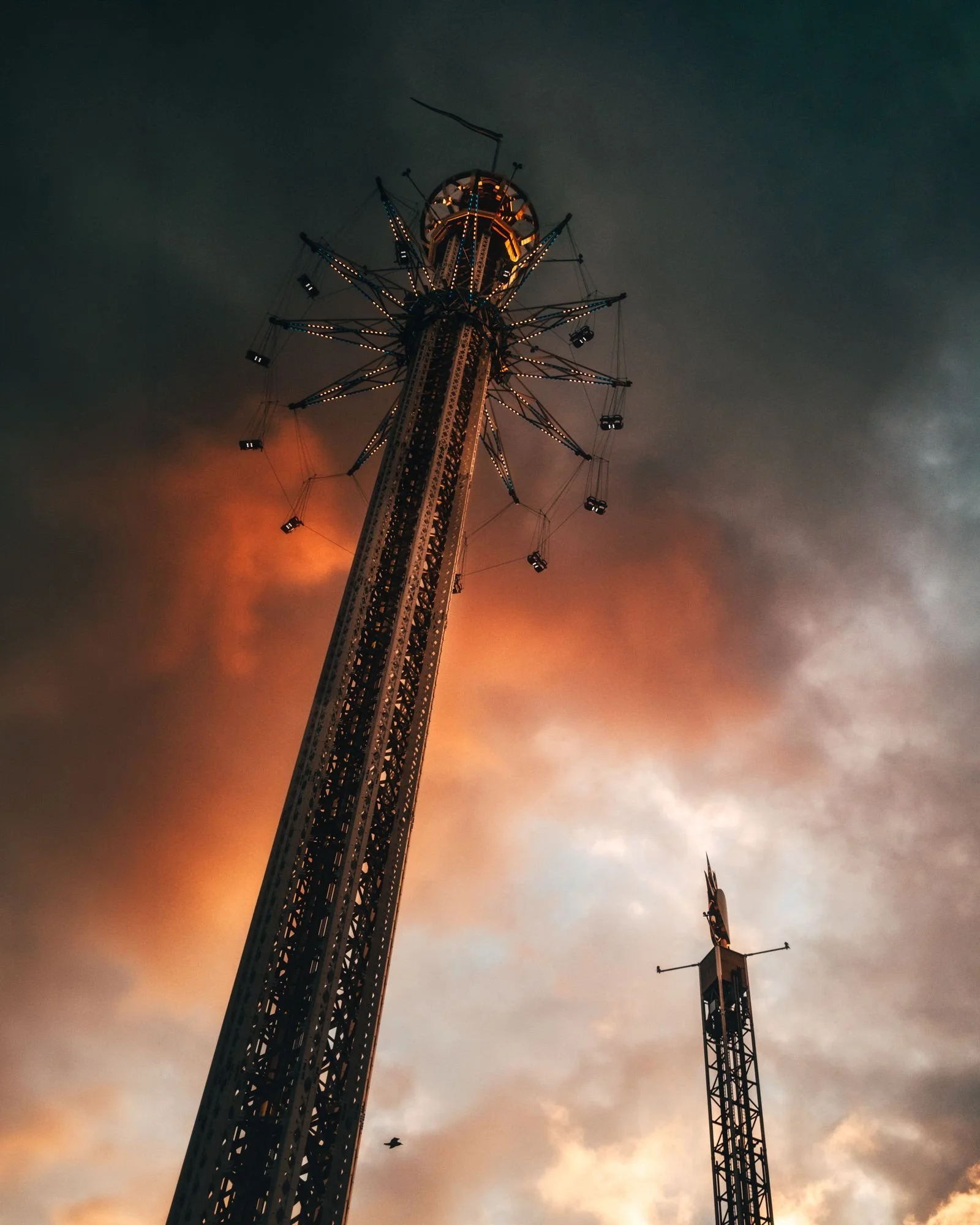 Gröna Lund amusement park tower ride against a dramatic stormy sky, Stockholm, Sweden fine art photography print