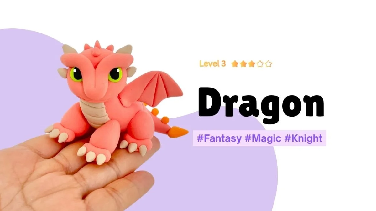 A handmade clay dragon placed on a hand, part of a kids craft activity.