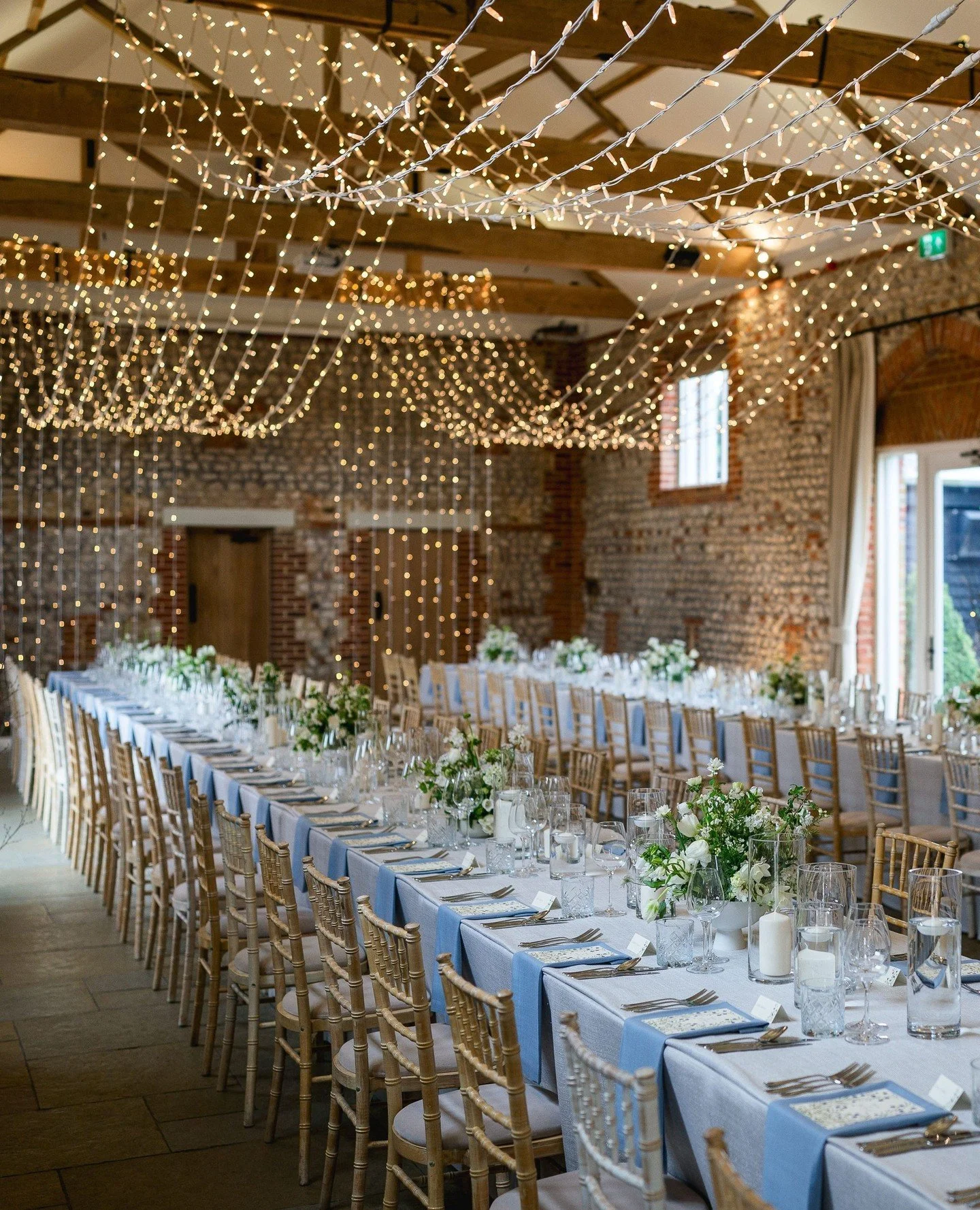 A beautifully layered Twin Canopy scheme, with a soft fairy light cascade from beam to floor ✨ bringing warmth, depth, and an intimate glow to every moment.⁠
⁠
Photography - guycollierphoto
Venue - @farbridgeevents⁠
Rigging - @stressfreehire⁠