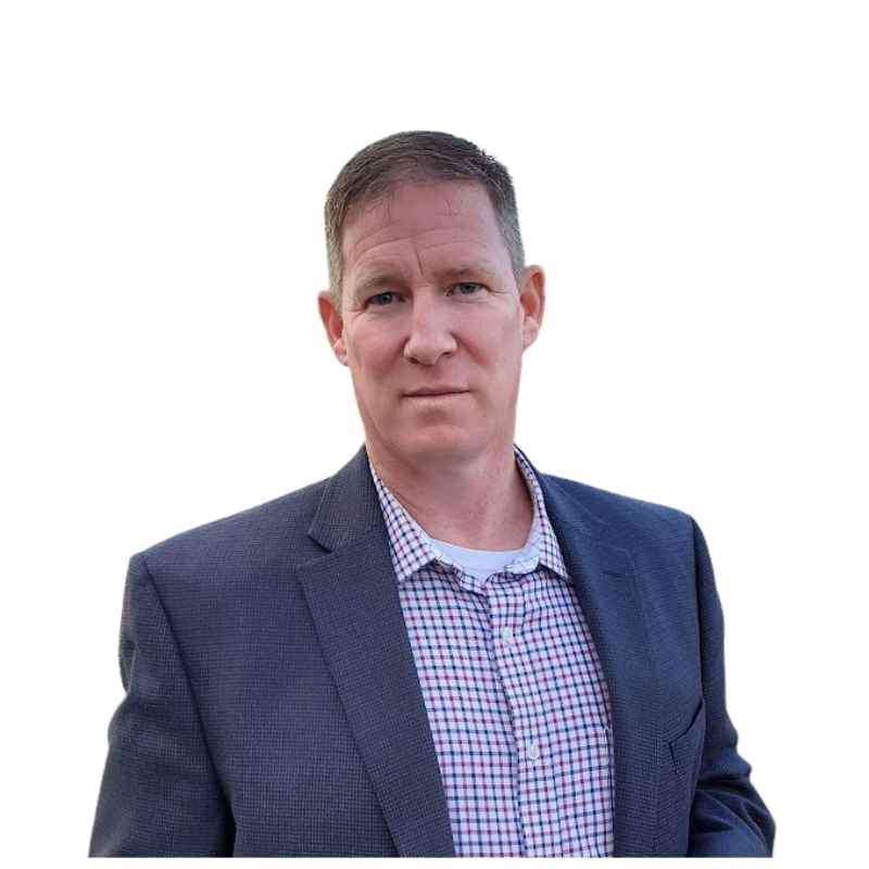 Eric Adams in a checkered shirt and a navy blazer poses against a white background.