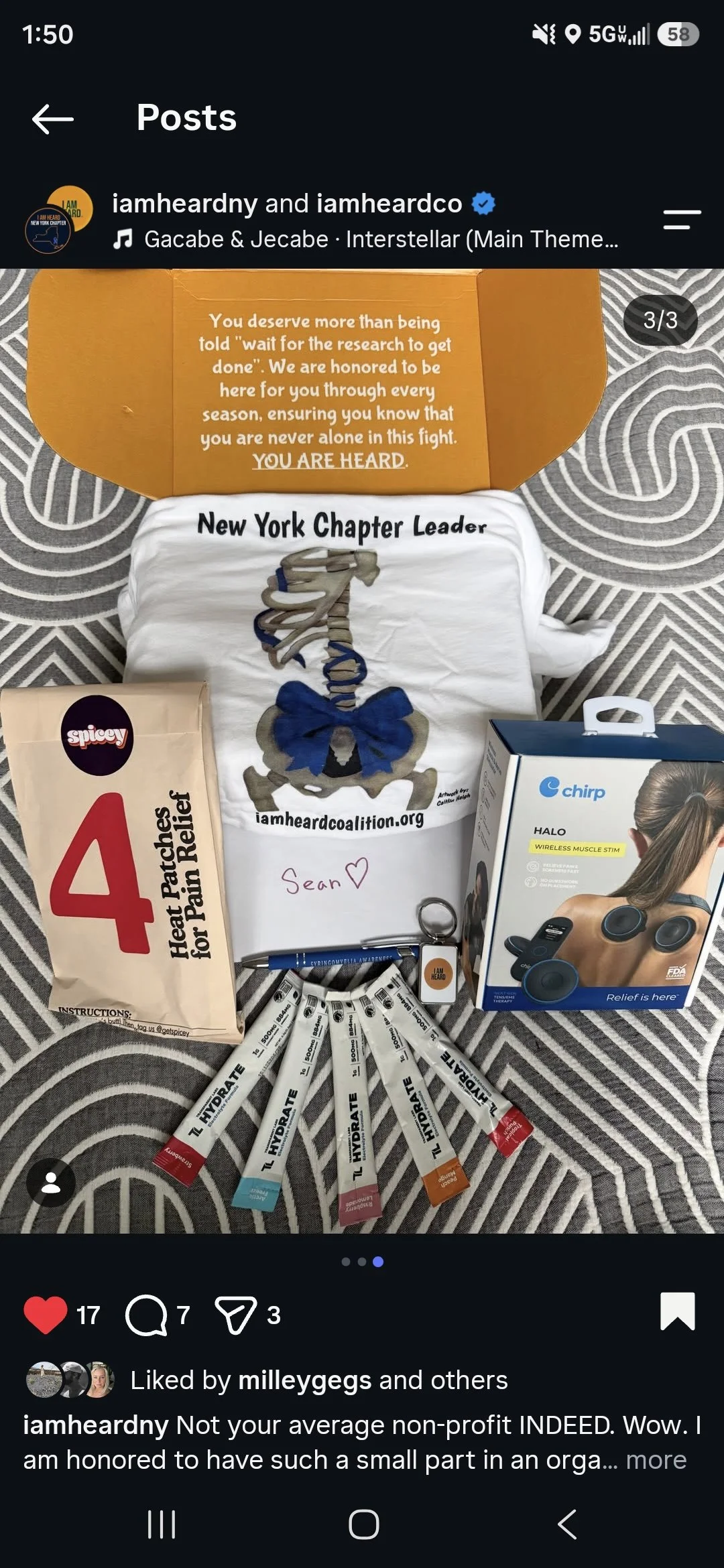 The image shows a box containing motivational text, with a pink lighting effect. There are also several stickers, wristbands, and papers, including one with the Tyler Organization logo and a contact email, inside the box.