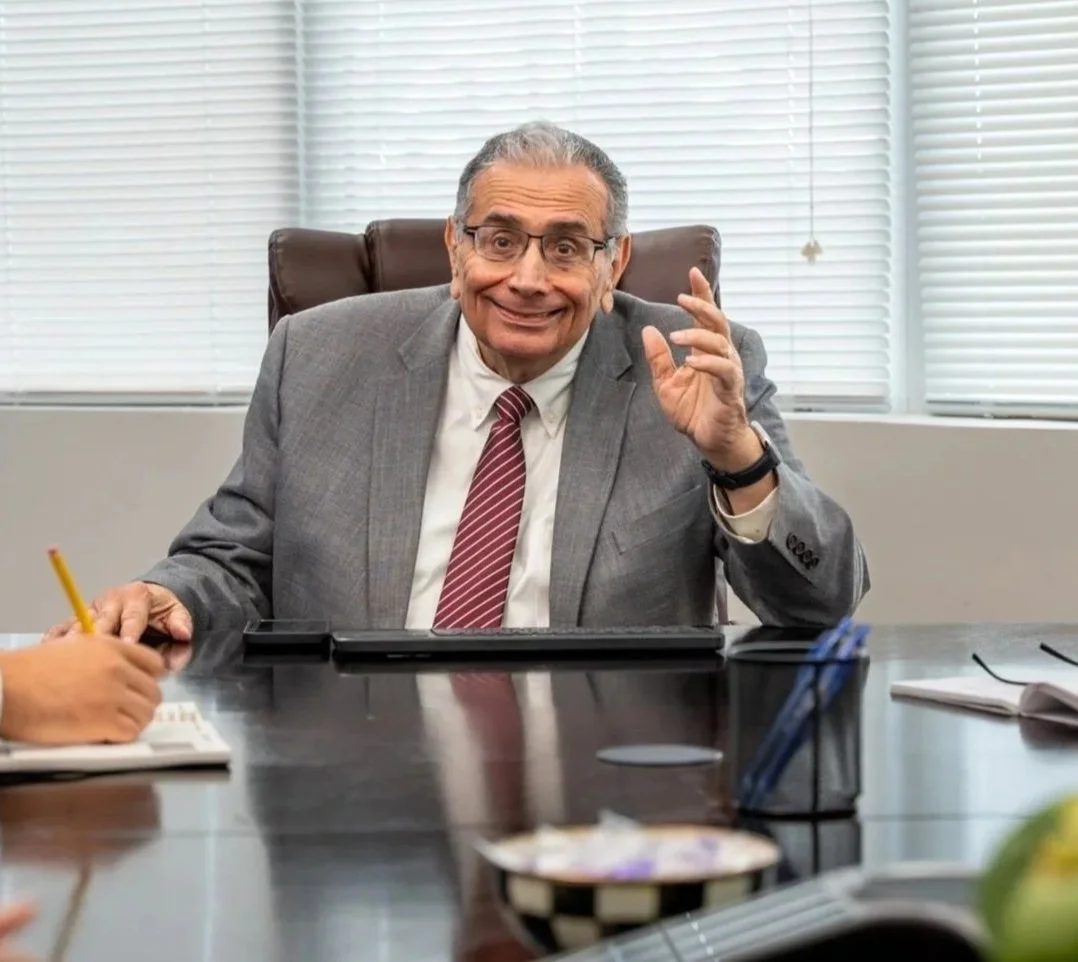 Photo of Ray M sitting in the boardroom