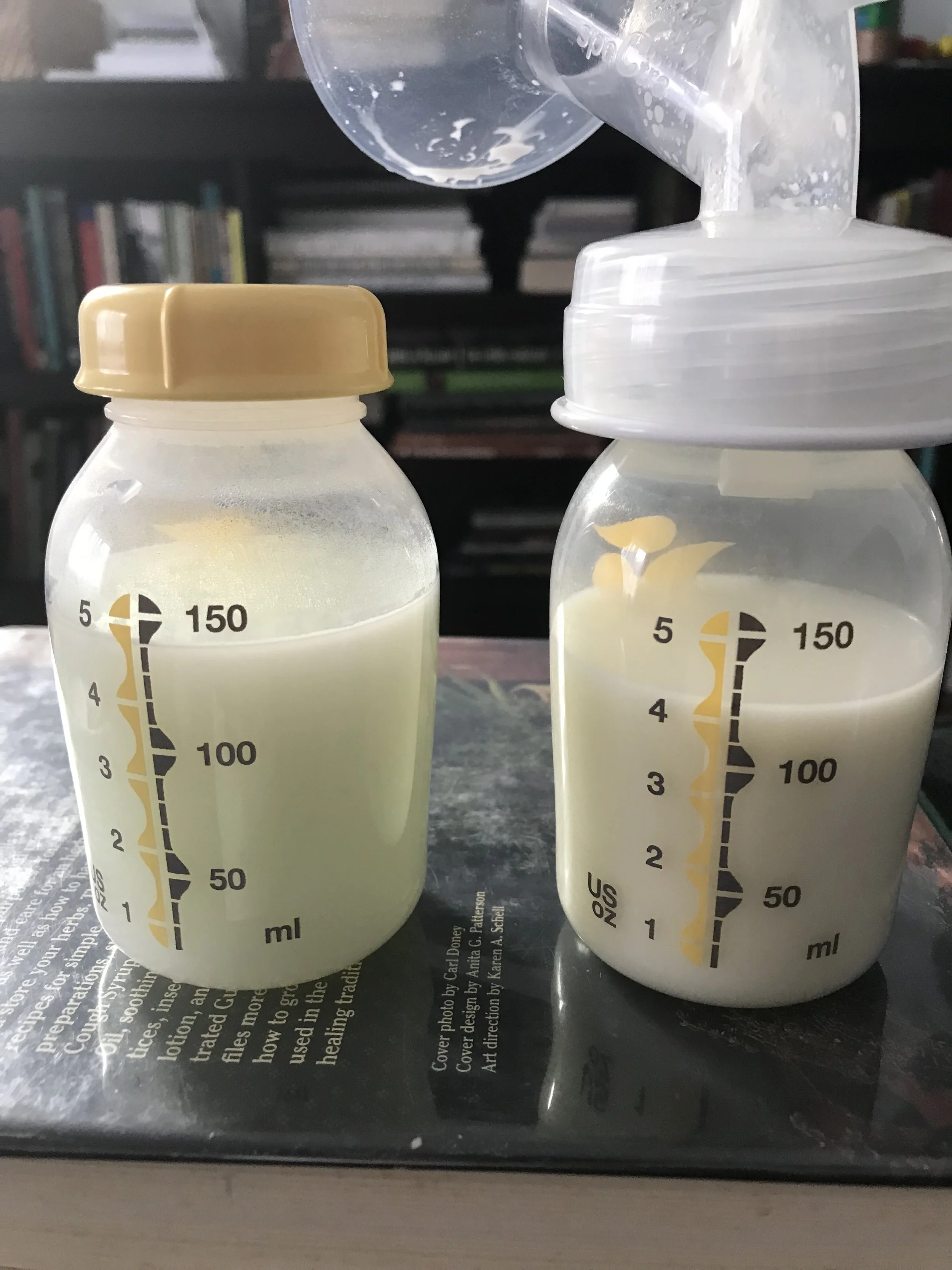 full bottles of pumped breastmilk