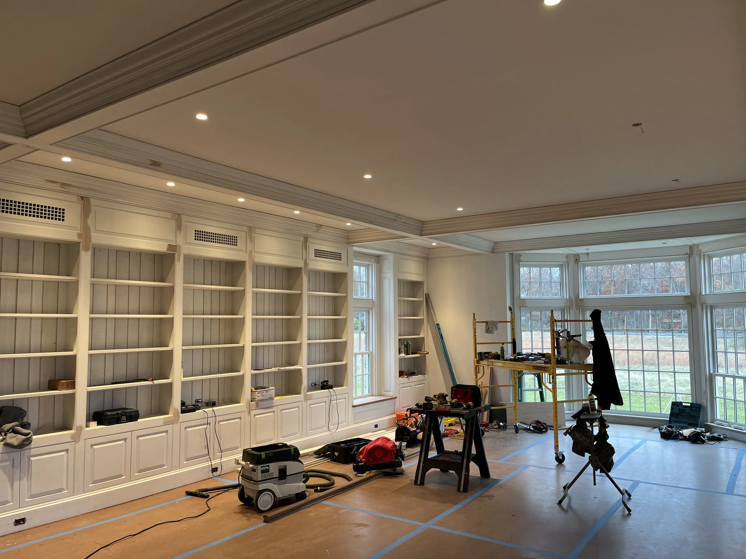 fireplace and bookcases w big window.jpeg