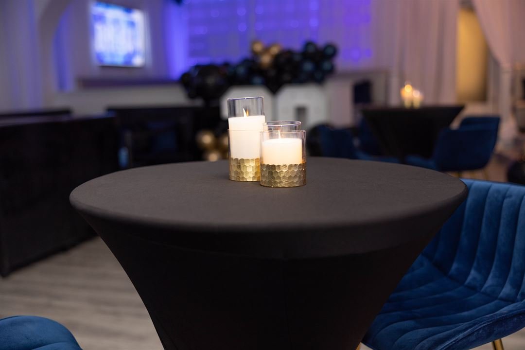Dream SF VIP room with gold bar stools and blue upholstery