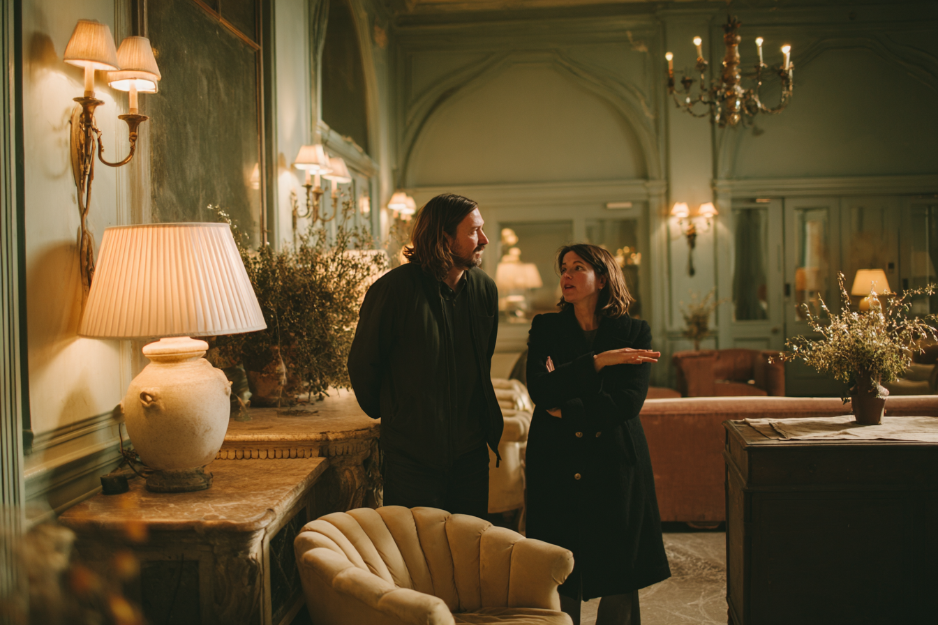 A couple on a venue walkthrough, picturing their event in the space