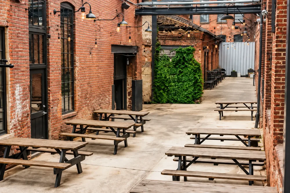 The brick courtyard at Guilford Hall set with picnic tables