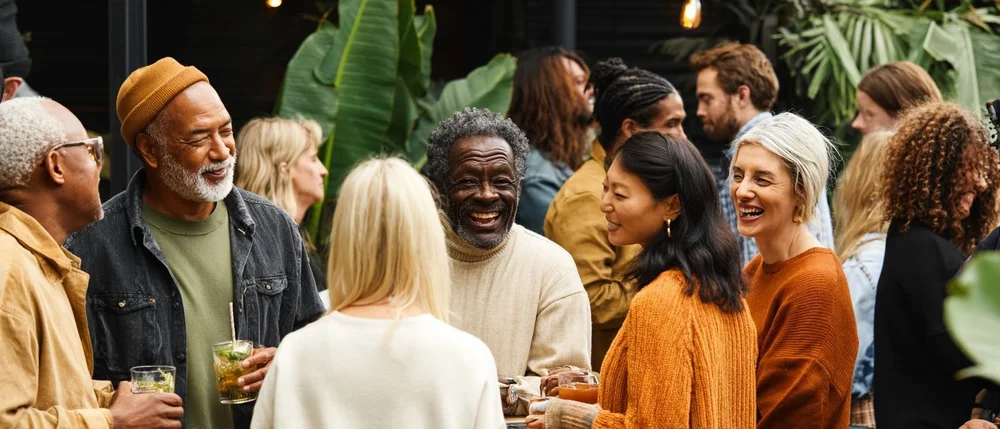 Friends talking at an afternoon garden party