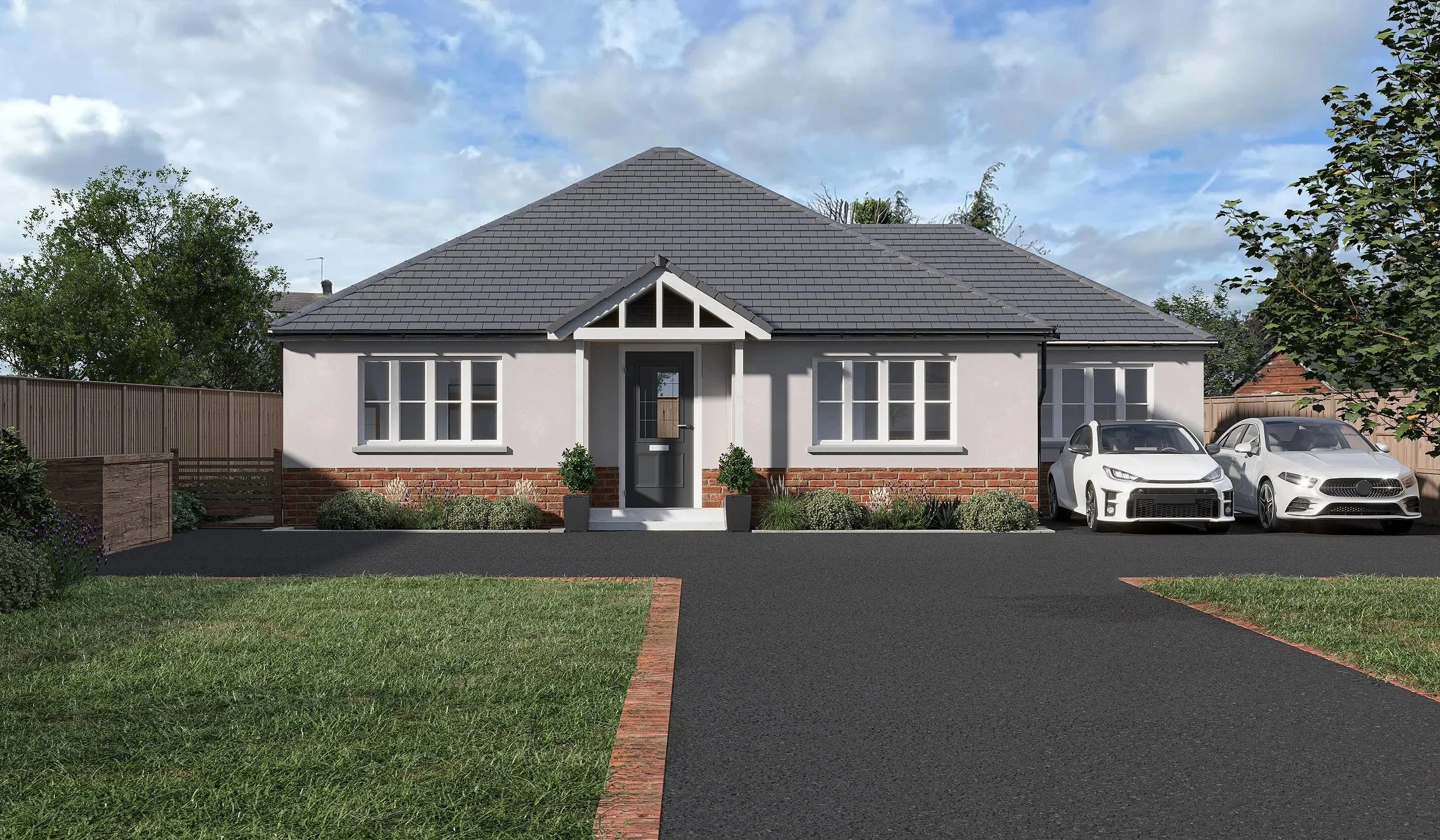 Front view of a modern single-story house with a gray tiled hip roof and white walls accented with red brick. The house has a central dark gray front door with a small porch and potted plants on either side. There are two windows on each side of the 