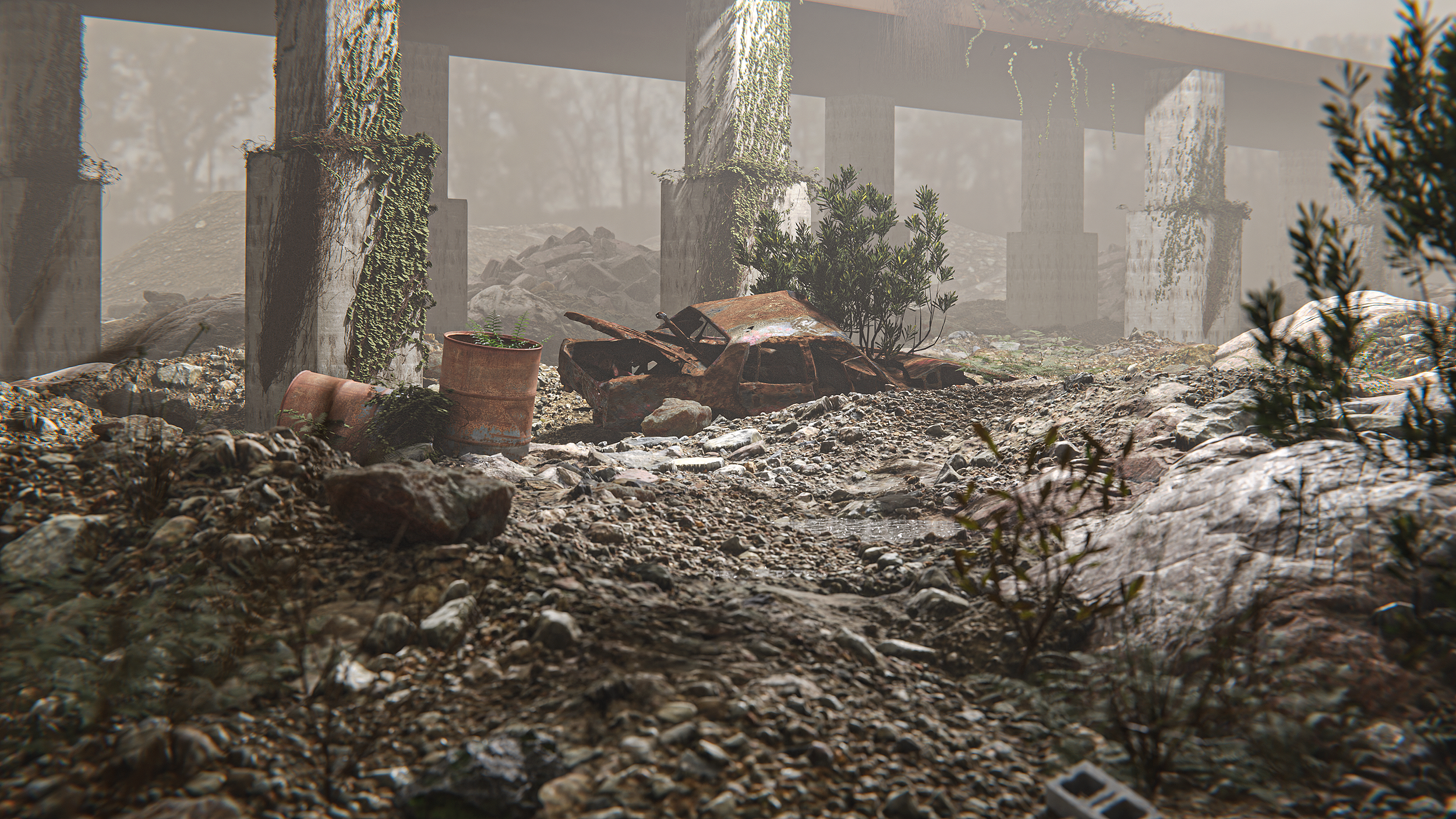 A desolate, rocky area under a bridge with a rusted, abandoned car and some scattered trash and plants growing among the debris.