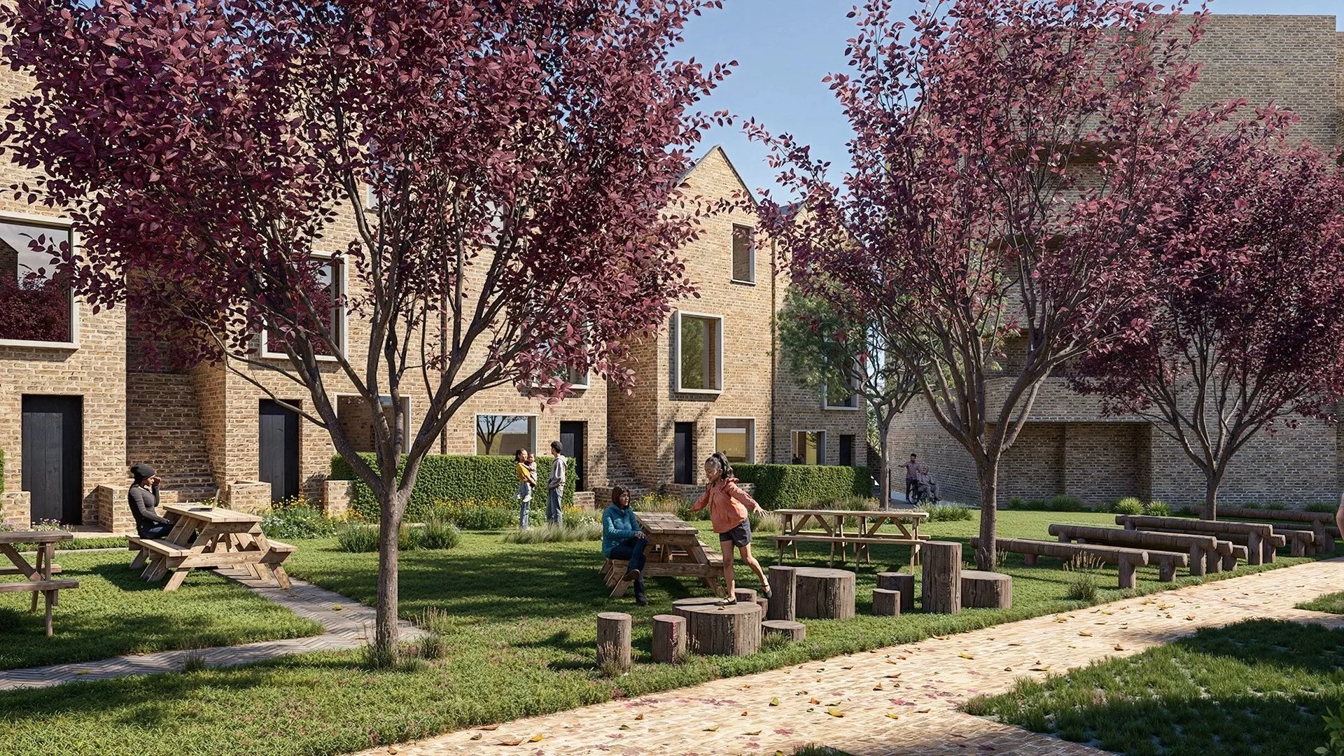 Landscaped residential courtyard visualisation featuring modern brick housing, green lawns, purple‑leaf trees, timber picnic tables, and natural log seating arranged in a communal play area. People are walking, sitting, and socialising, creating a li
