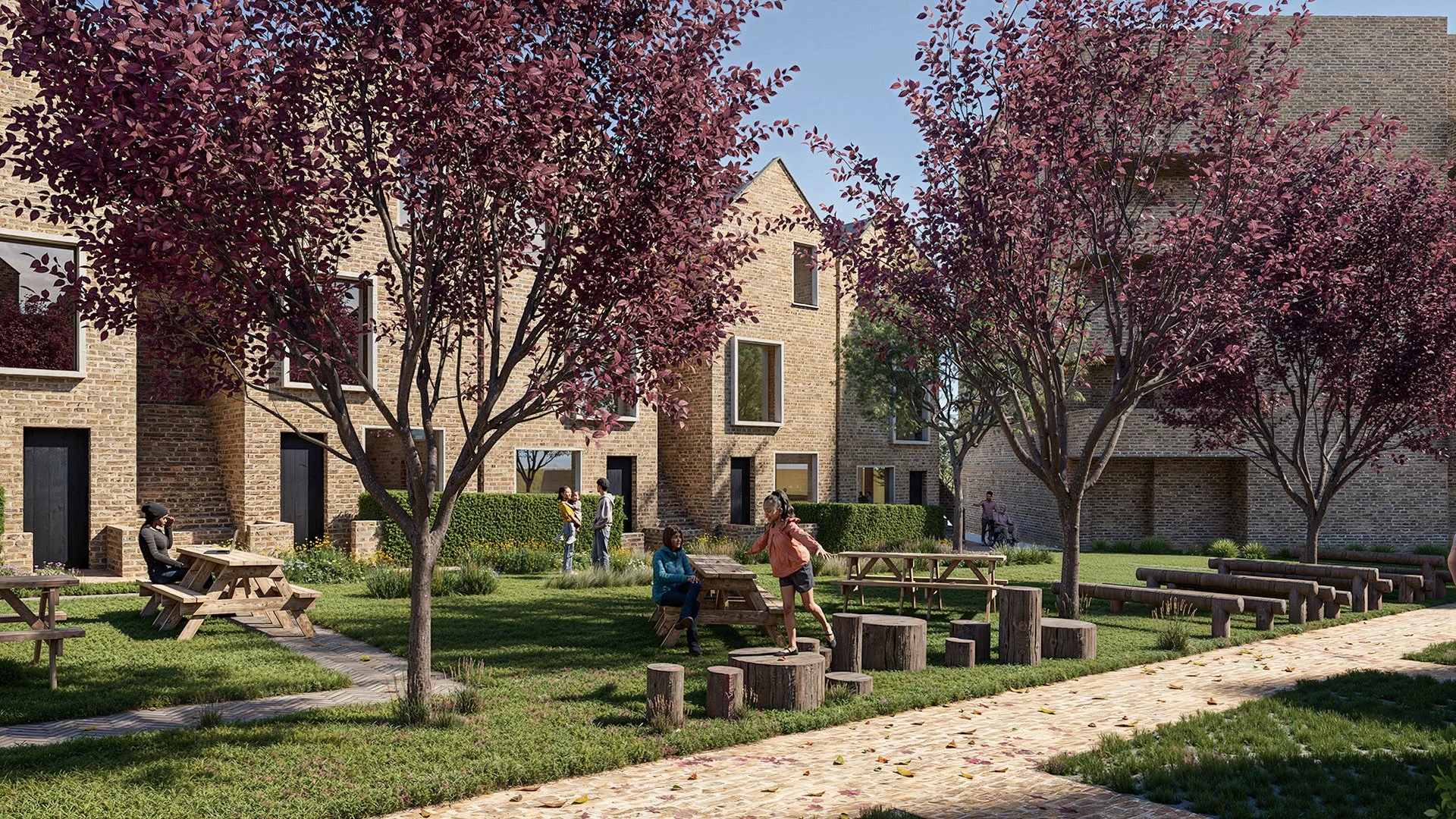 Landscaped residential courtyard visualisation featuring modern brick housing, green lawns, purple‑leaf trees, timber picnic tables, and natural log seating arranged in a communal play area. People are walking, sitting, and socialising, creating a li