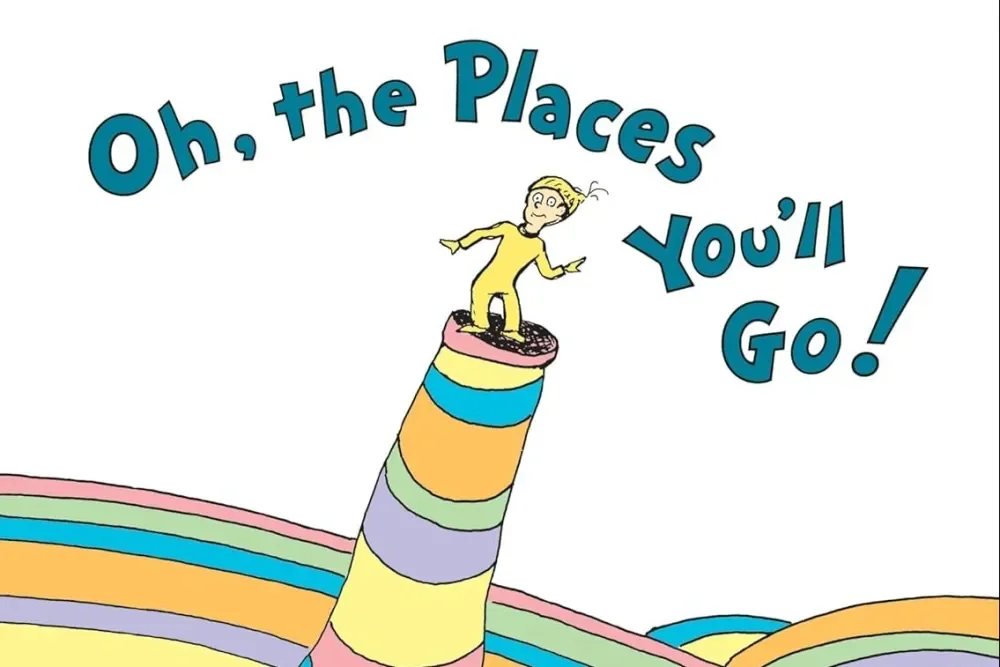 A cartoon child standing on top of a colorful, striped, rainbow-like hill with the text "Oh, the Places You'll Go!" in playful blue letters above.