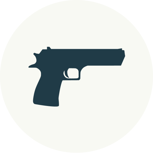 Silhouette of a handgun in dark color on a white circular background.