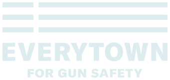 Sign reading 'Everytown for Gun Safety' with a black background and white text.