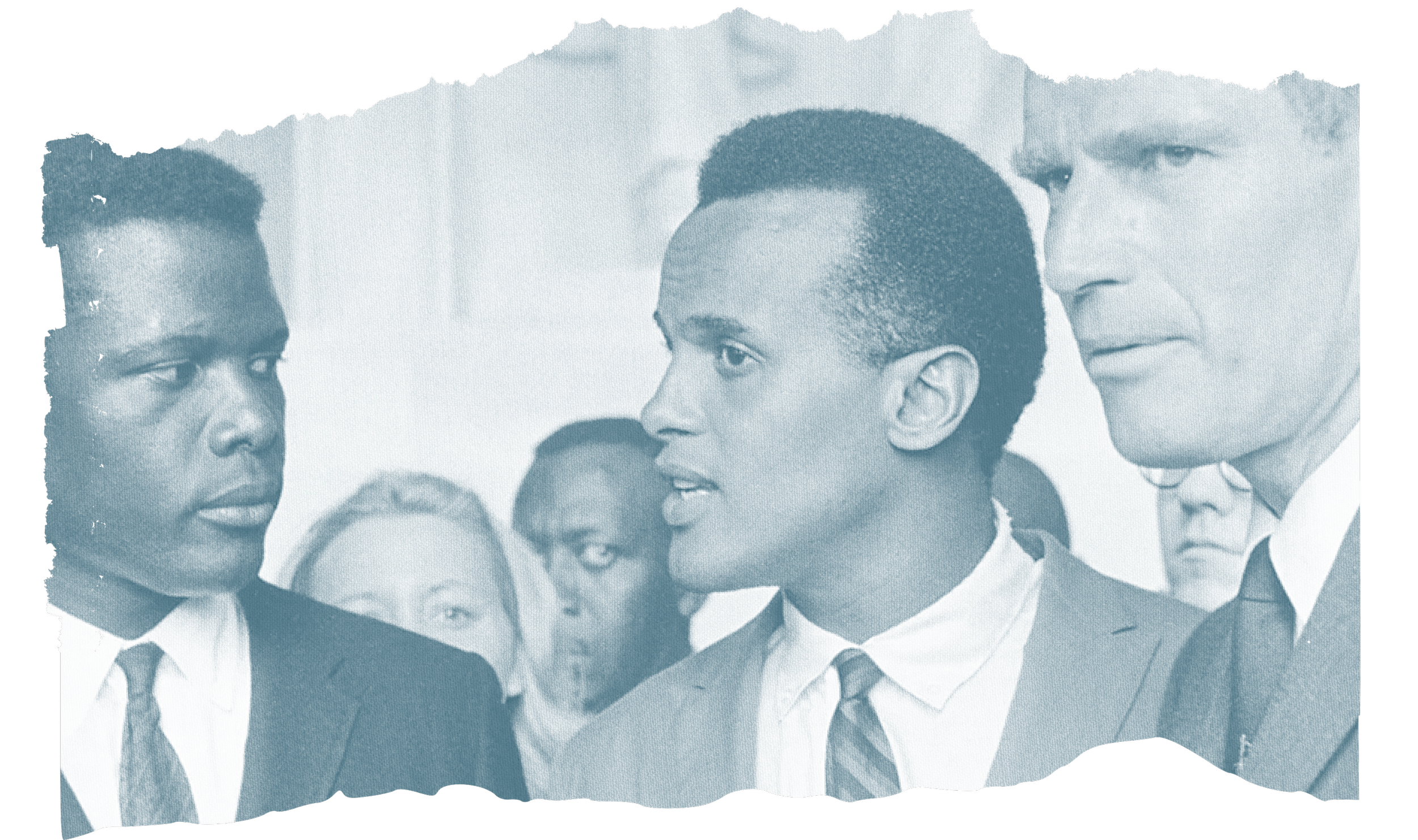 Older man in suit and tie speaking to young Black man in suit and tie, with other individuals in the background.