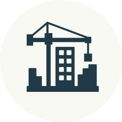 Construction crane above a building under construction.