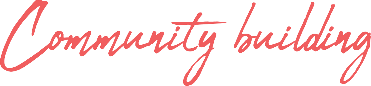 The image features the phrase "community building" written in a cursive, pink font.