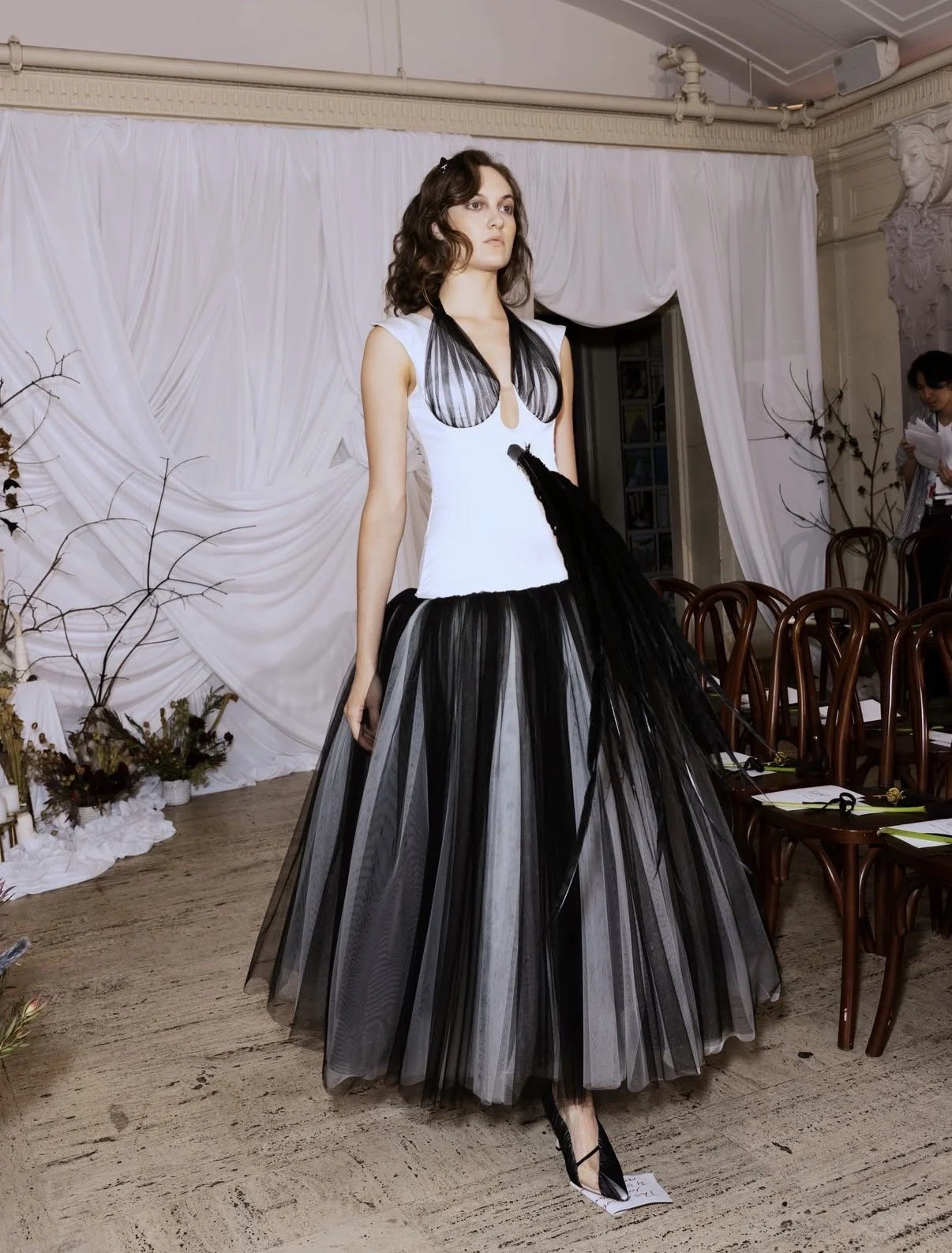 Model rehearses in full look during the Dress + Tech rehearsal for Tang Chi Couture’s NYFW SS27 runway show.