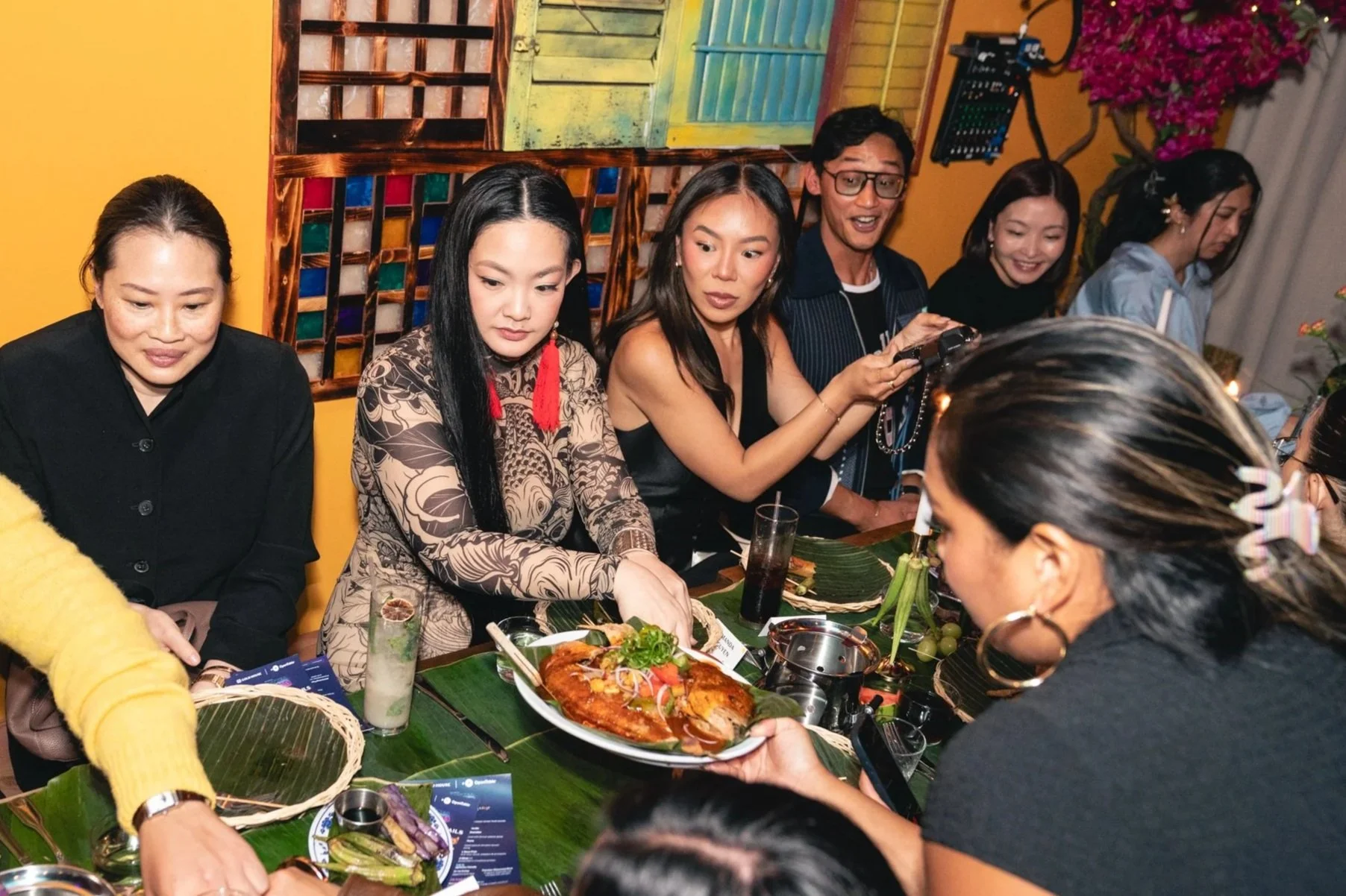 Family-style dinner service during the Forgotten Island event at Kalye NYC.
