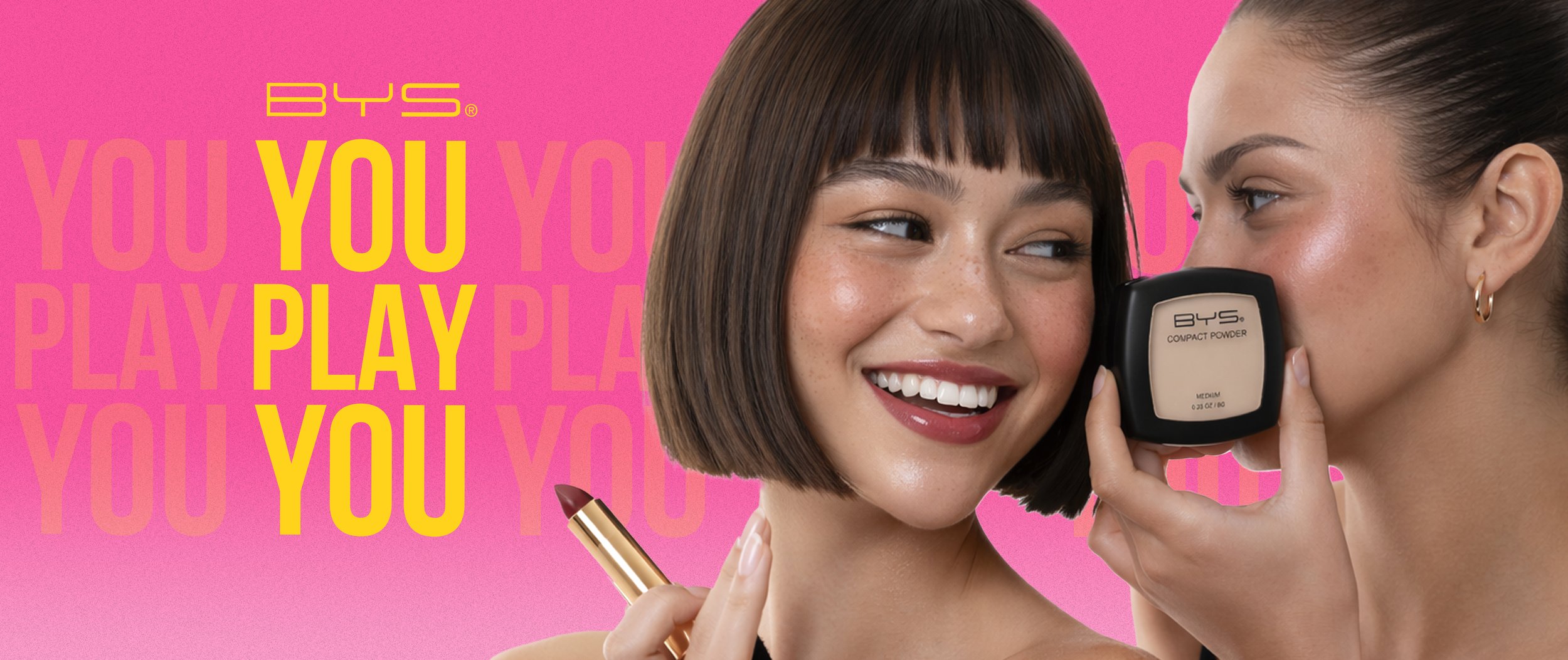 BYS “You Play You” campaign artwork featuring two models with compact powder and lipstick against a pink background.