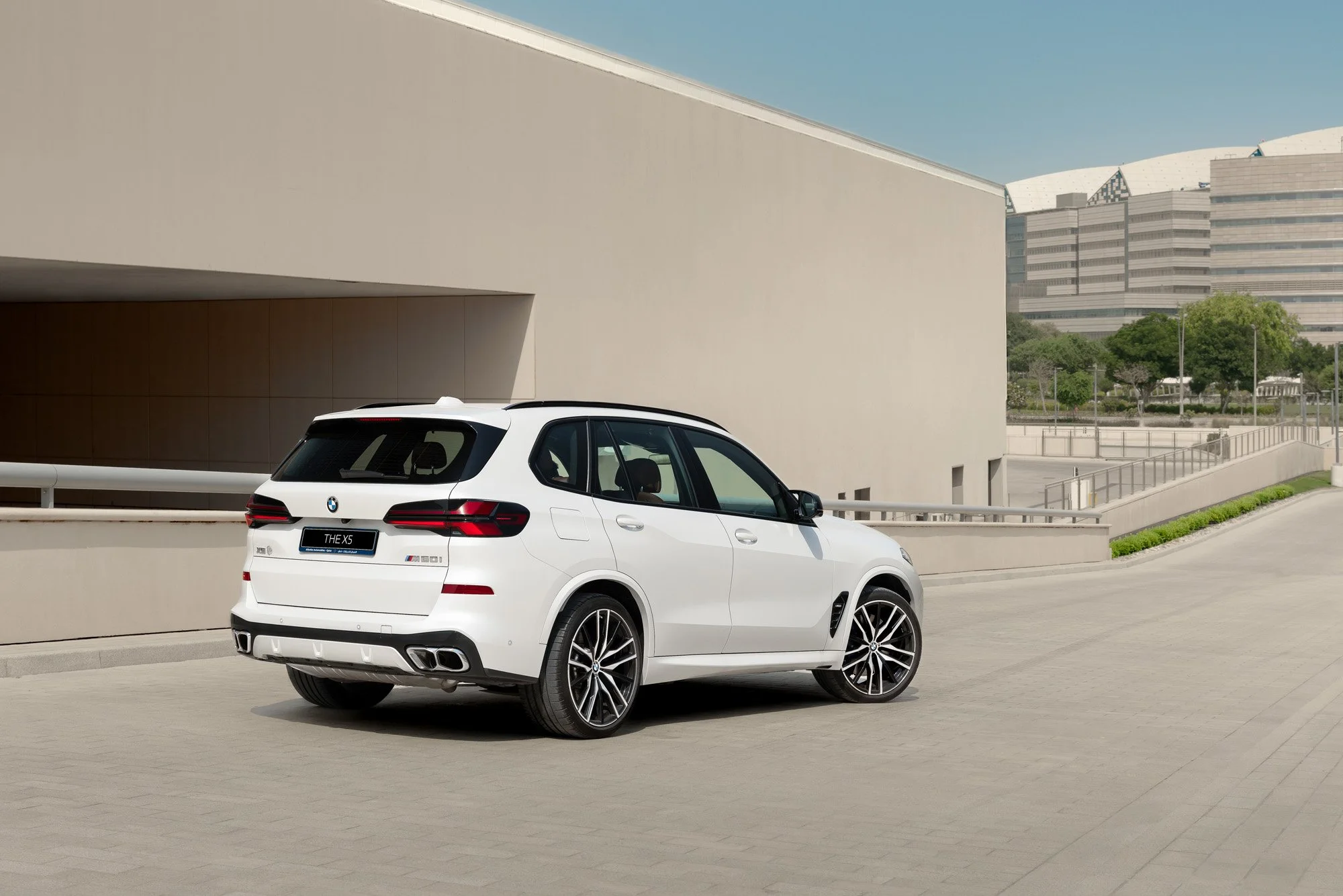 White BMW X5 M60i in Doha, Qatar. Photography by Talha Belal.