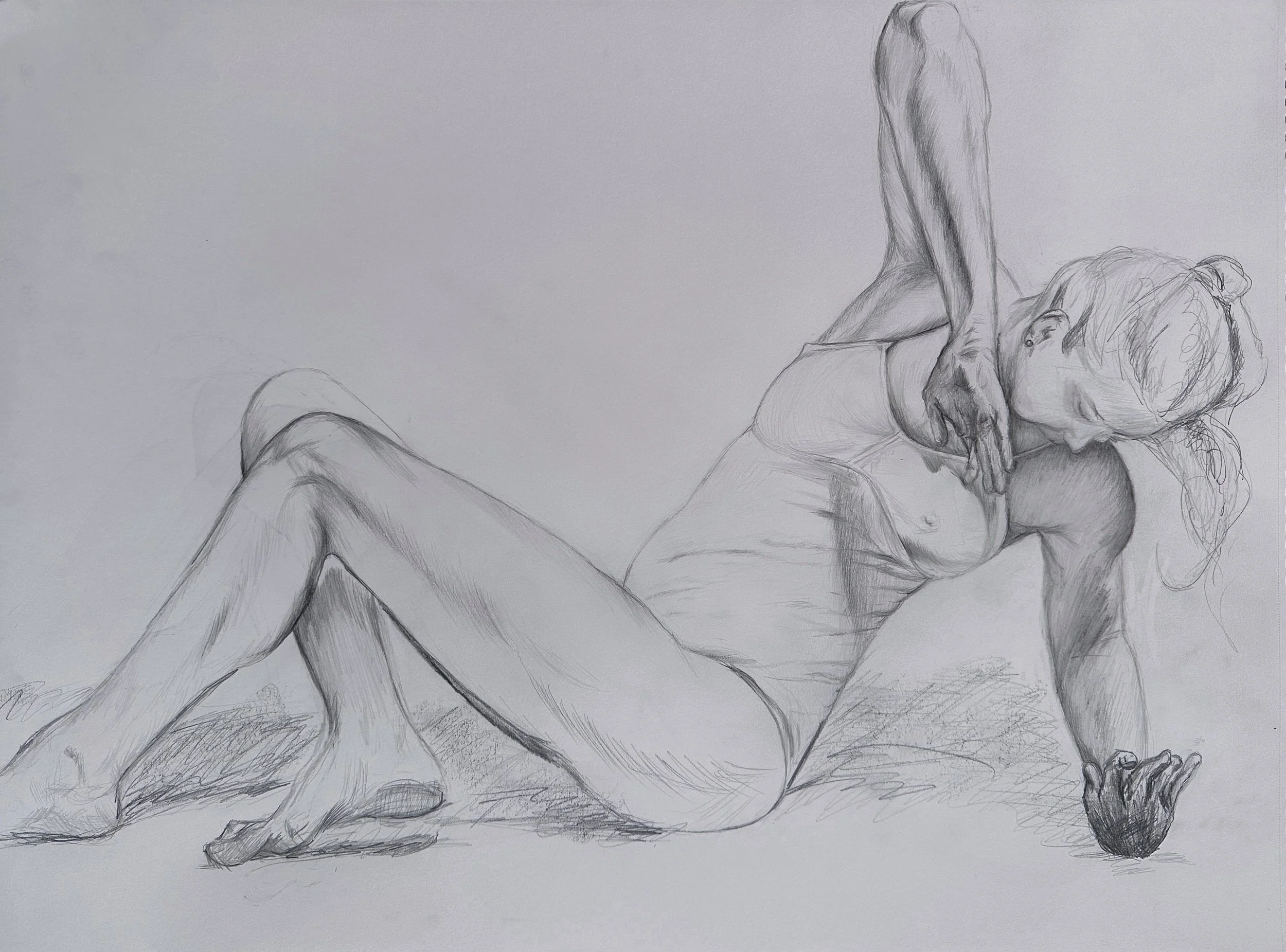 A detailed pencil sketch of a woman with curly hair lying on her side, with her knees bent and one hand resting on her head. The sketch emphasizes realistic anatomy and shading.