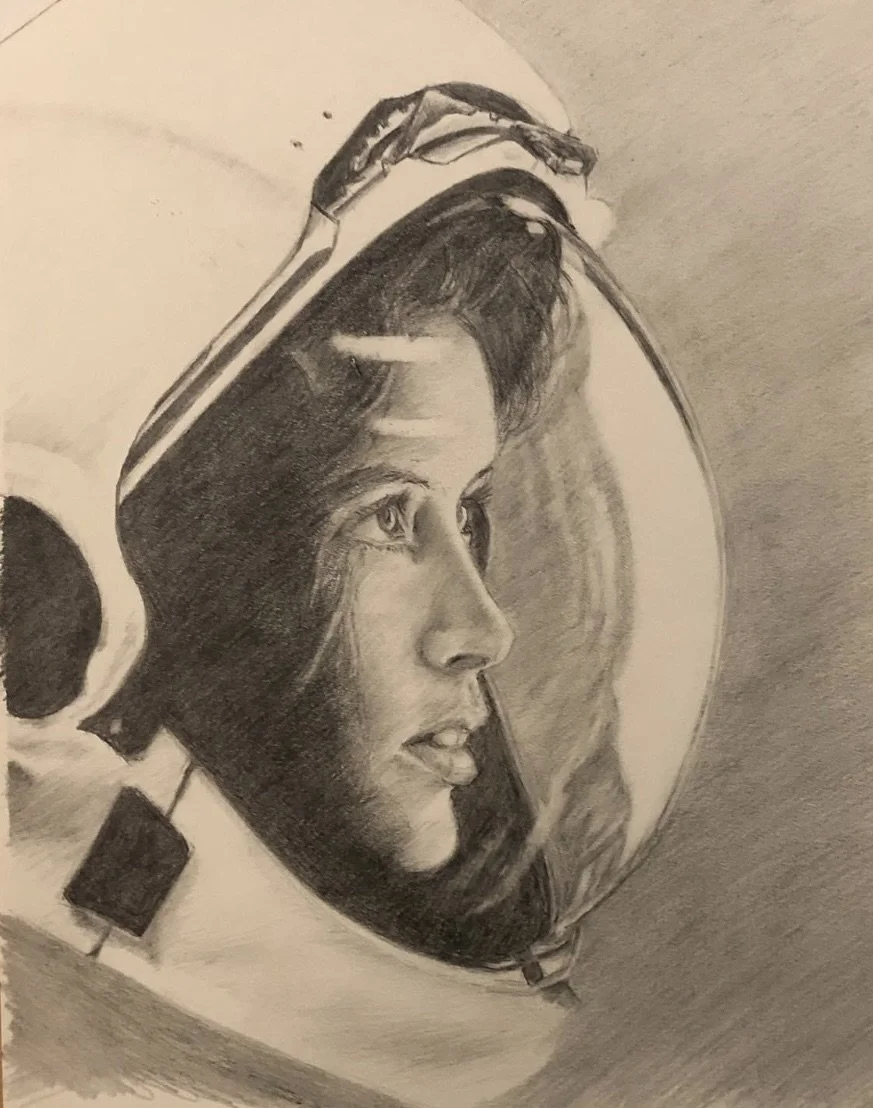 A detailed pencil drawing of a woman's face inside a helmet, with realistic shading and textures.
