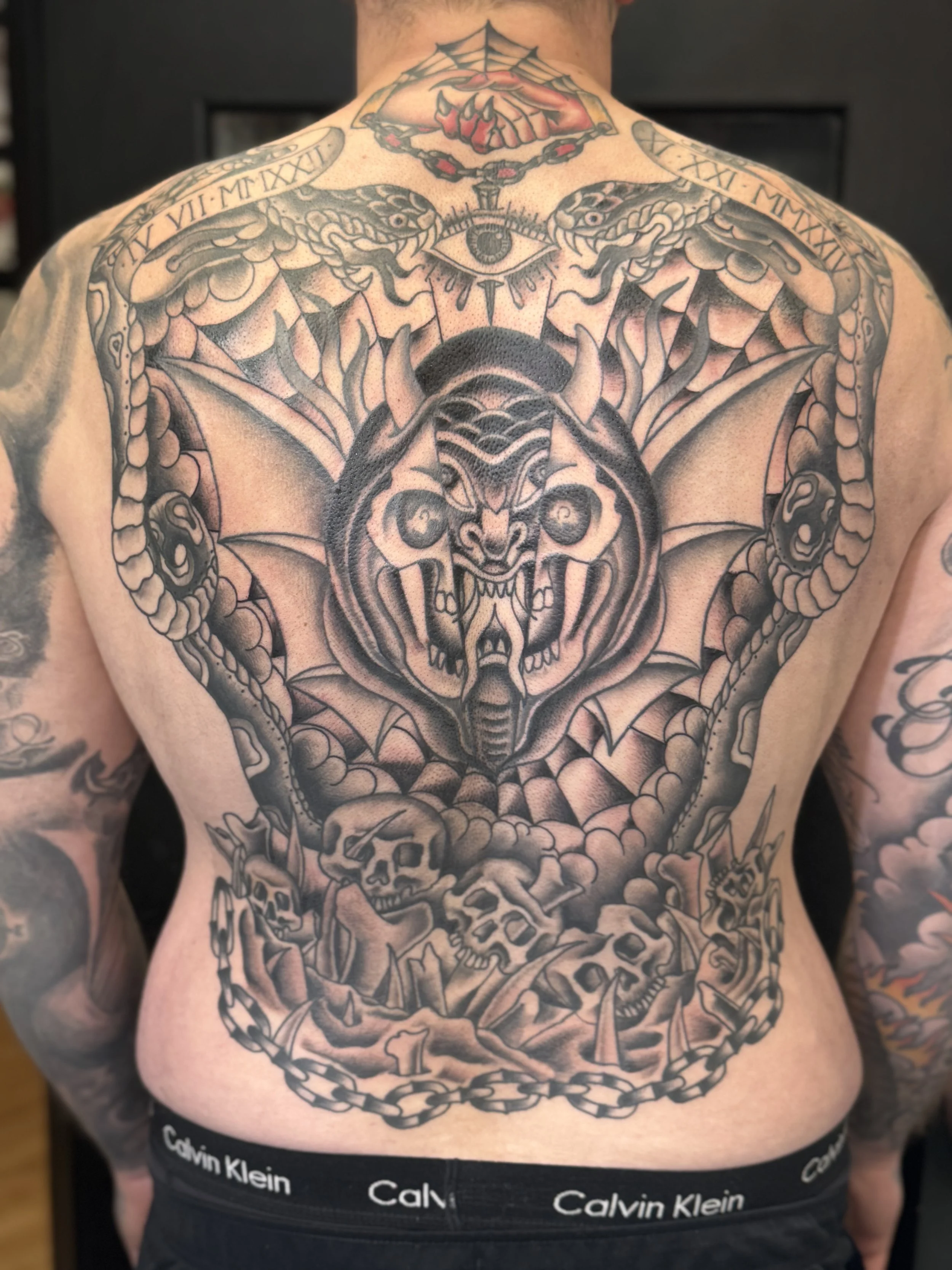 rick_traditional_blackandgrey_backpiece.jpeg