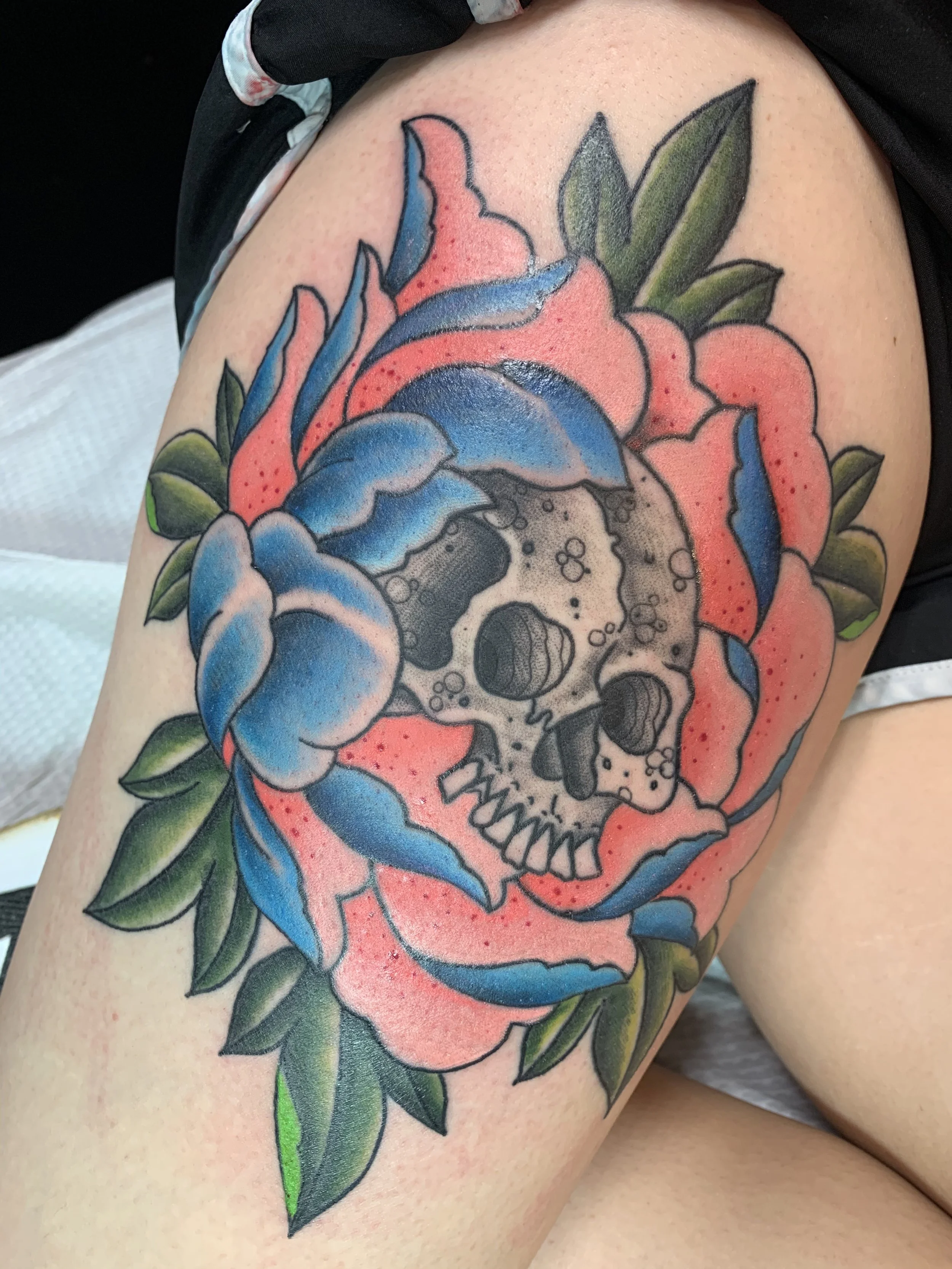 emily_traditional_peony_skull_tattoo.jpeg