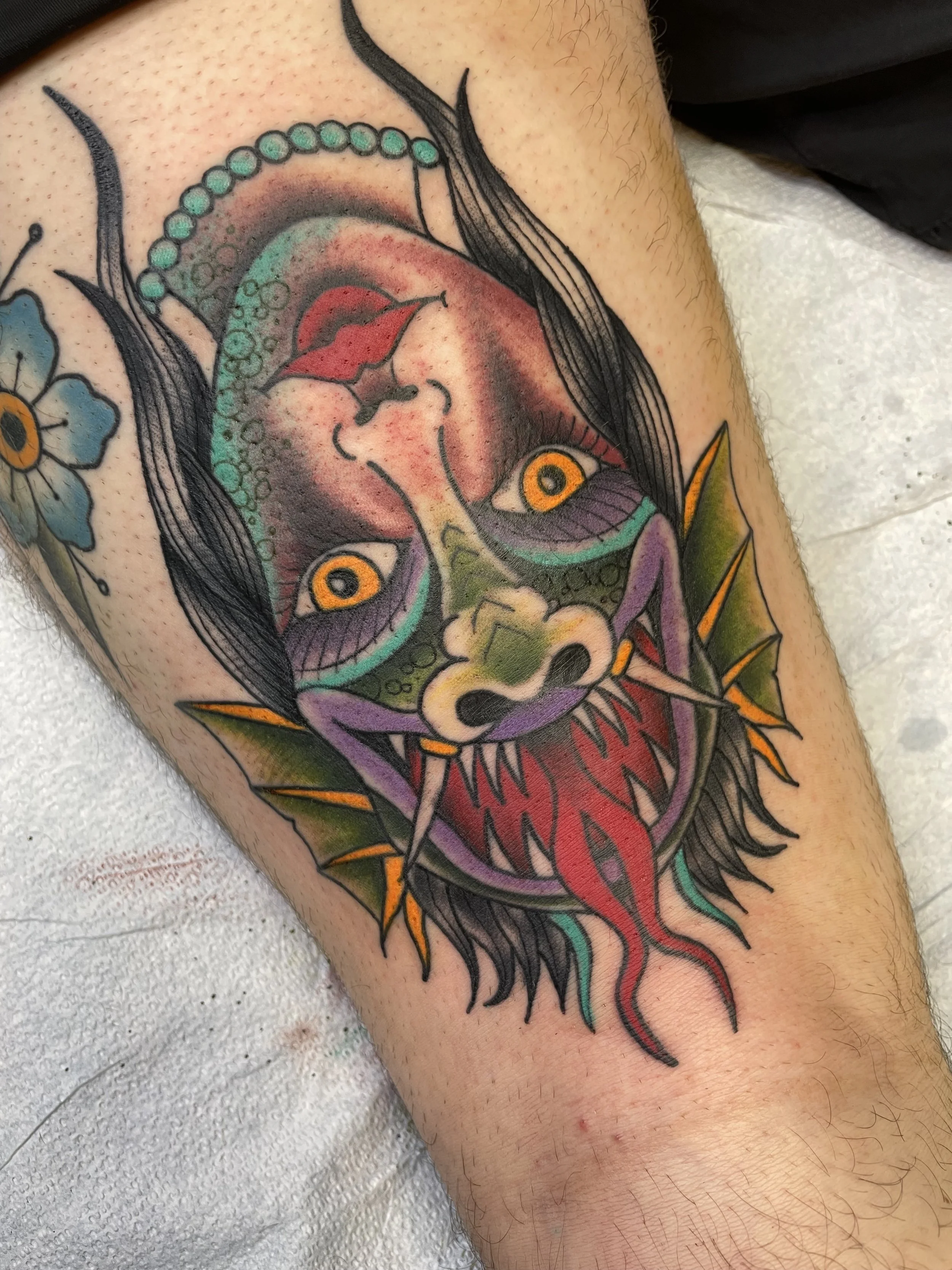 joe_traditional_girlhead_flip_tattoo.jpeg