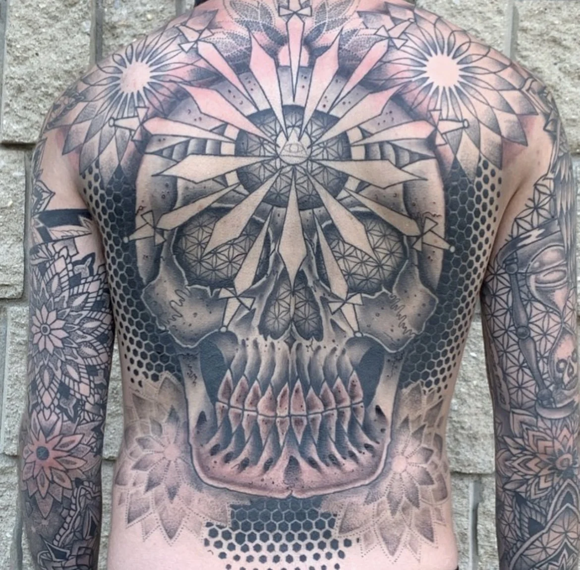 nicky_sacred_geometry_backpiece_tattoo.jpg