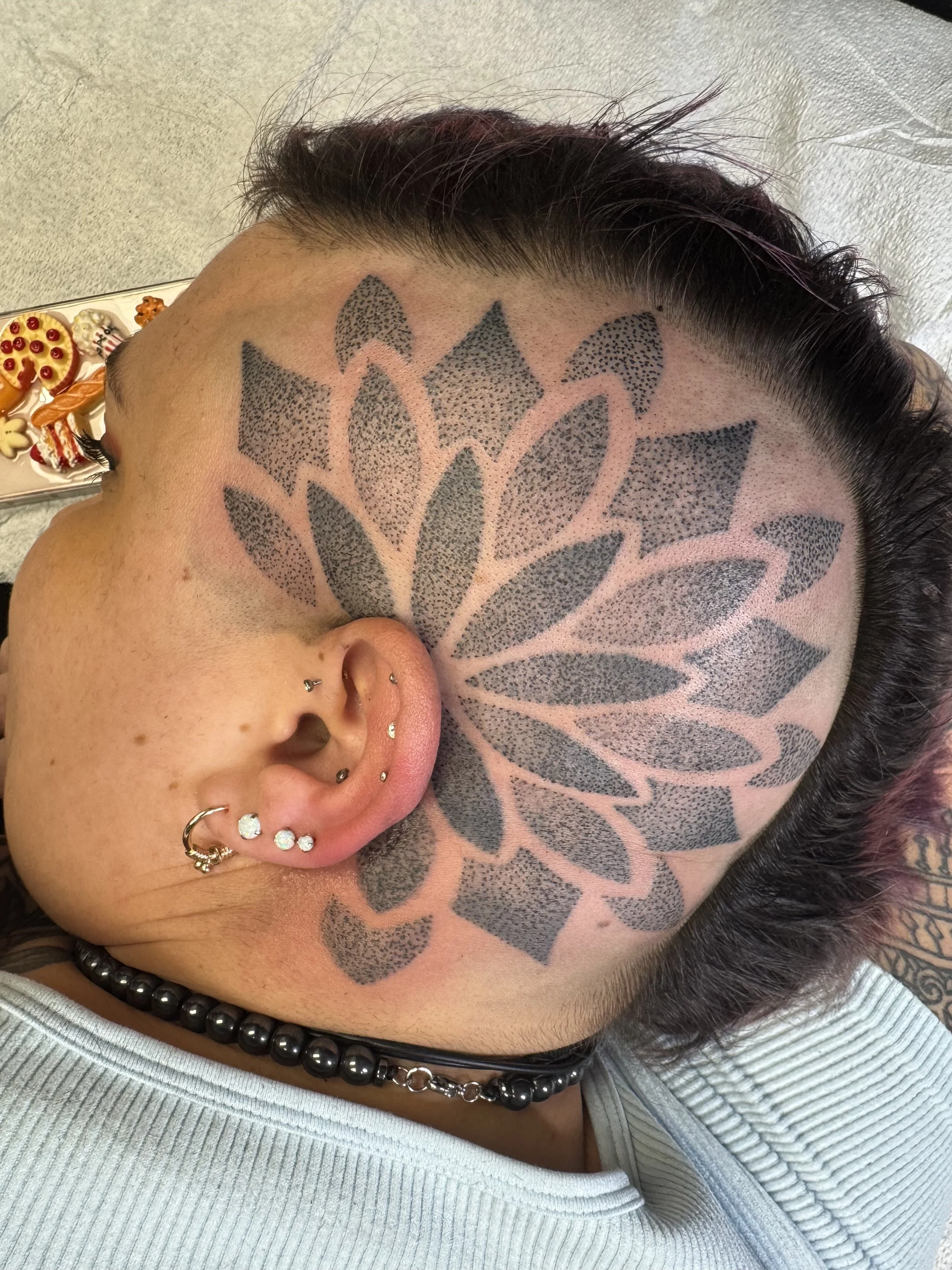 bianca_sacred_geometry_head_tattoo.jpeg