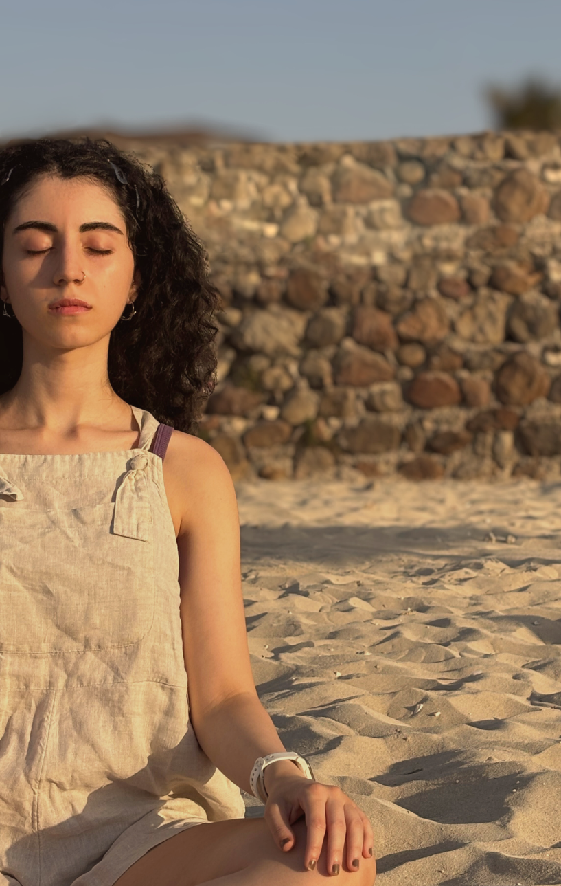 Founder of MYSA Mindfulness practicing meditation outdoors, reflecting mindfulness and embodied awareness