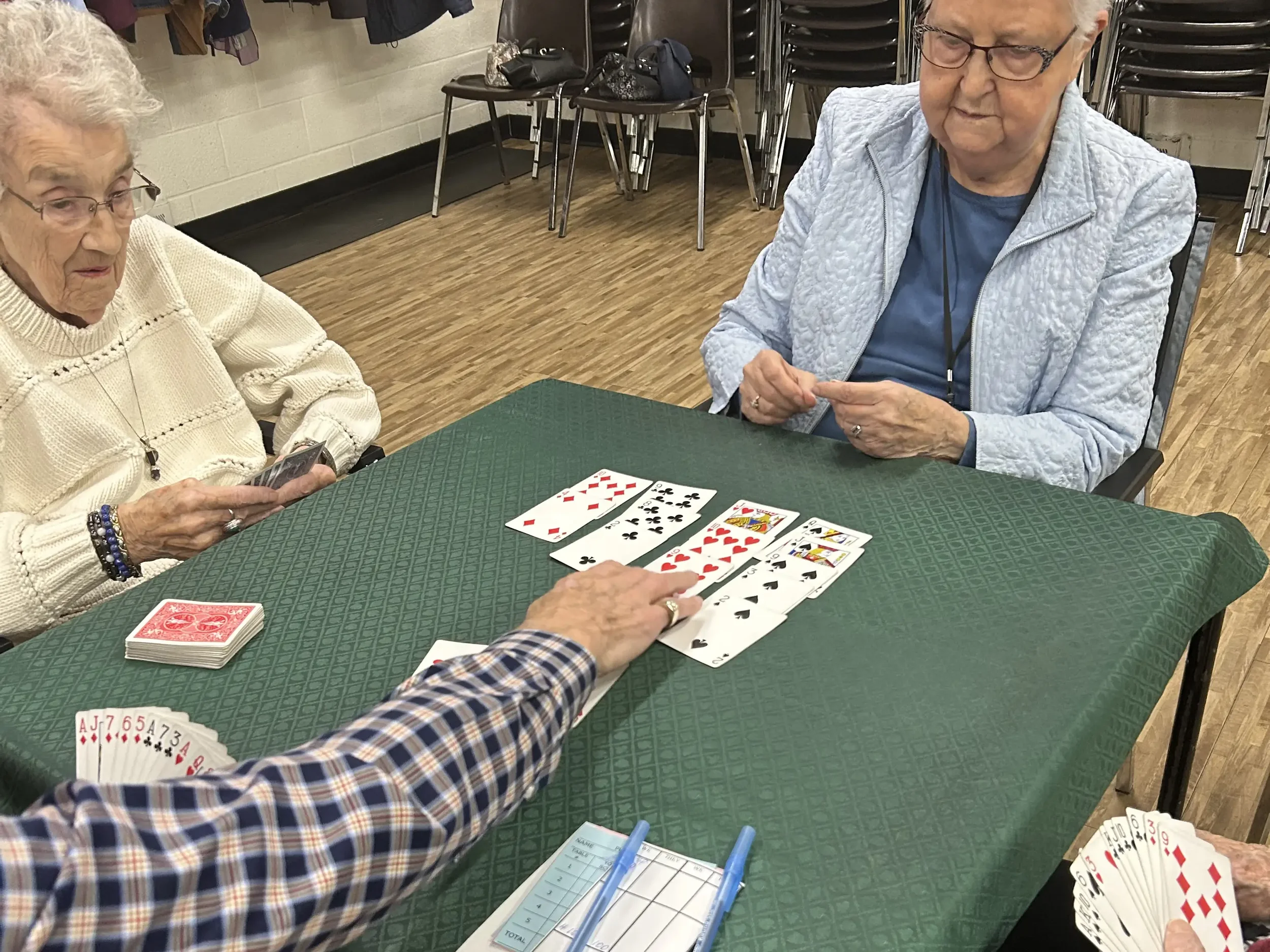 Seniors playing the card game "bridge".