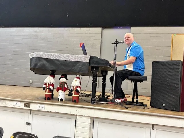 entertainer Terry  Hokness christmas luncheon.jpg