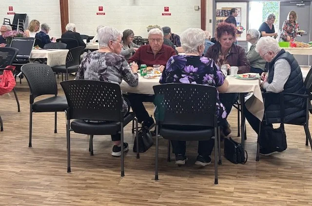 members enjoying fall BBQ 2025.jpg