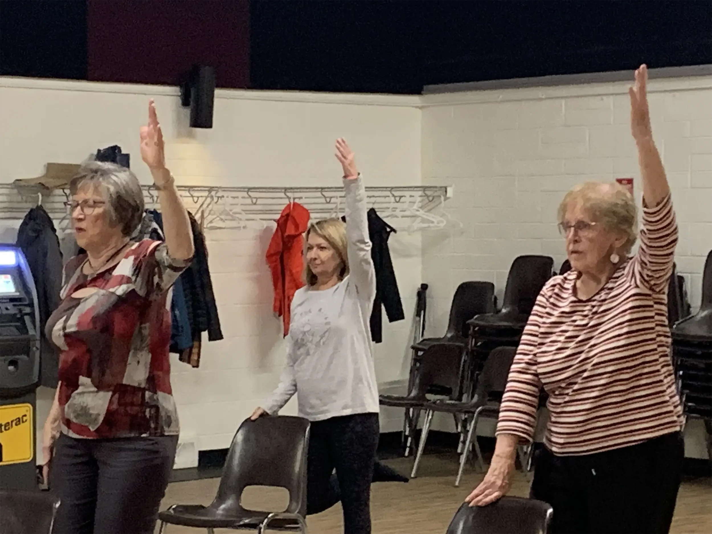 Seniors keeping fit by stretching.