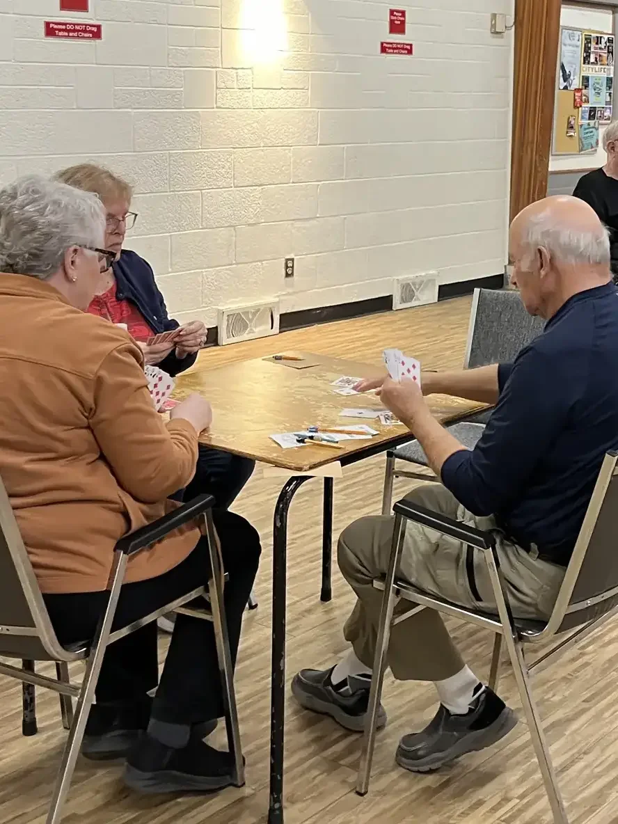 Seniors Playing the card game "kaiser" at the Cosmo Seniors Centre.