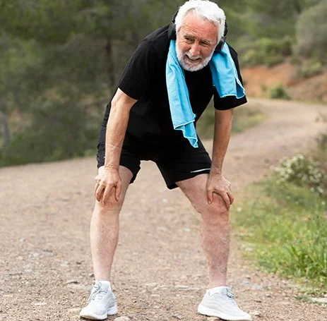 Man with knee osteoarthritis on trail