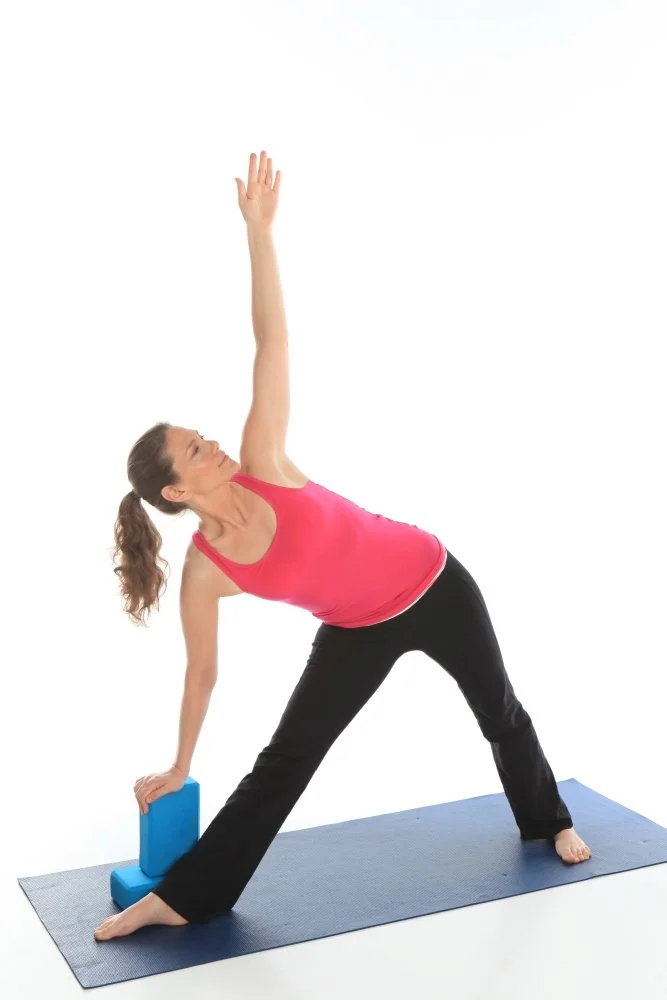 Christine Wushke with yoga blocks