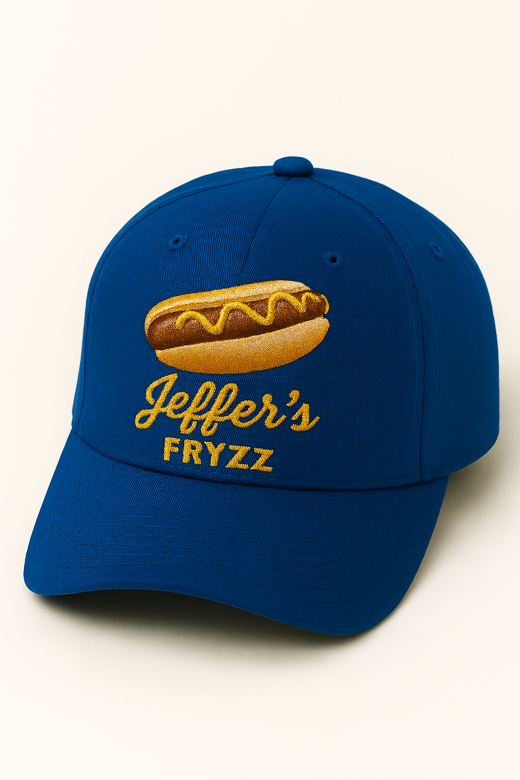Blue baseball cap with an embroidered hot dog and the text "Jeffery's FRYZZ" on the front.