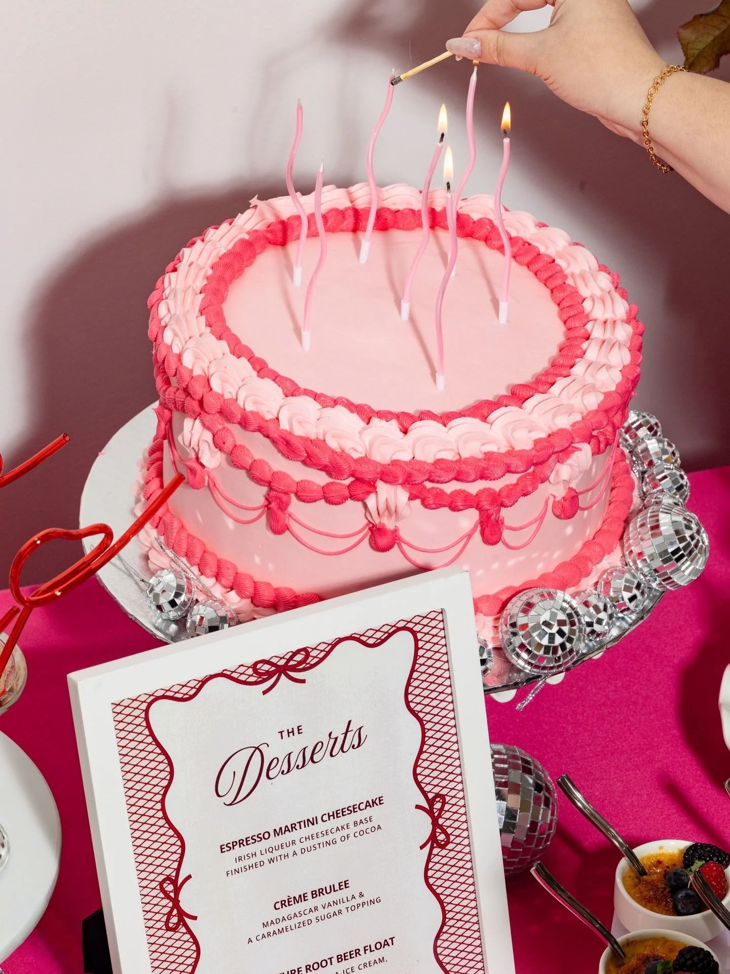 It&rsquo;s Galentine&rsquo;s, but planned early 💕

Created and captured in January, before the aesthetic made its rounds.

Feminine, bold, a little indulgent: cake couture, delicious dessert, disco details, moody florals and Jell-O shots with attitu