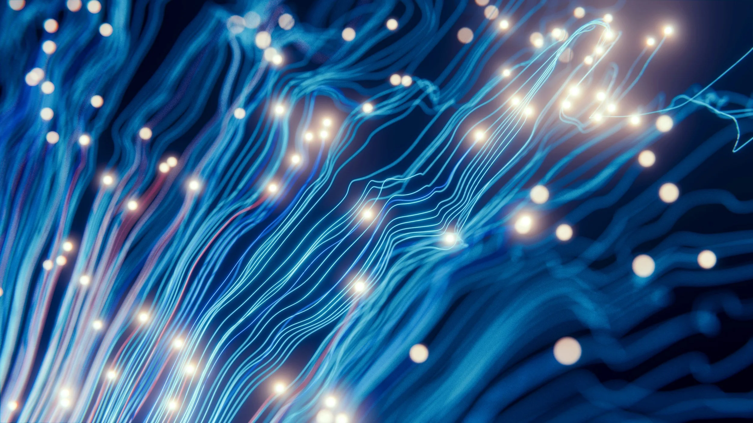 A digital abstract artwork representing data or fiber optic cables with flowing blue lines and small glowing white dots.