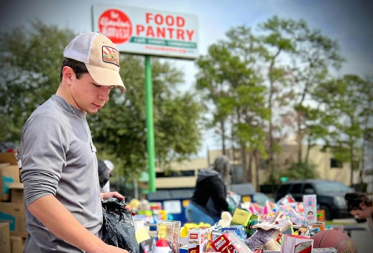The Abundant Harvest Food Pantry Volunteer Sorting Food